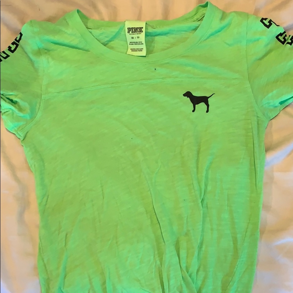 A Victoria’s Secret pink t shirt.